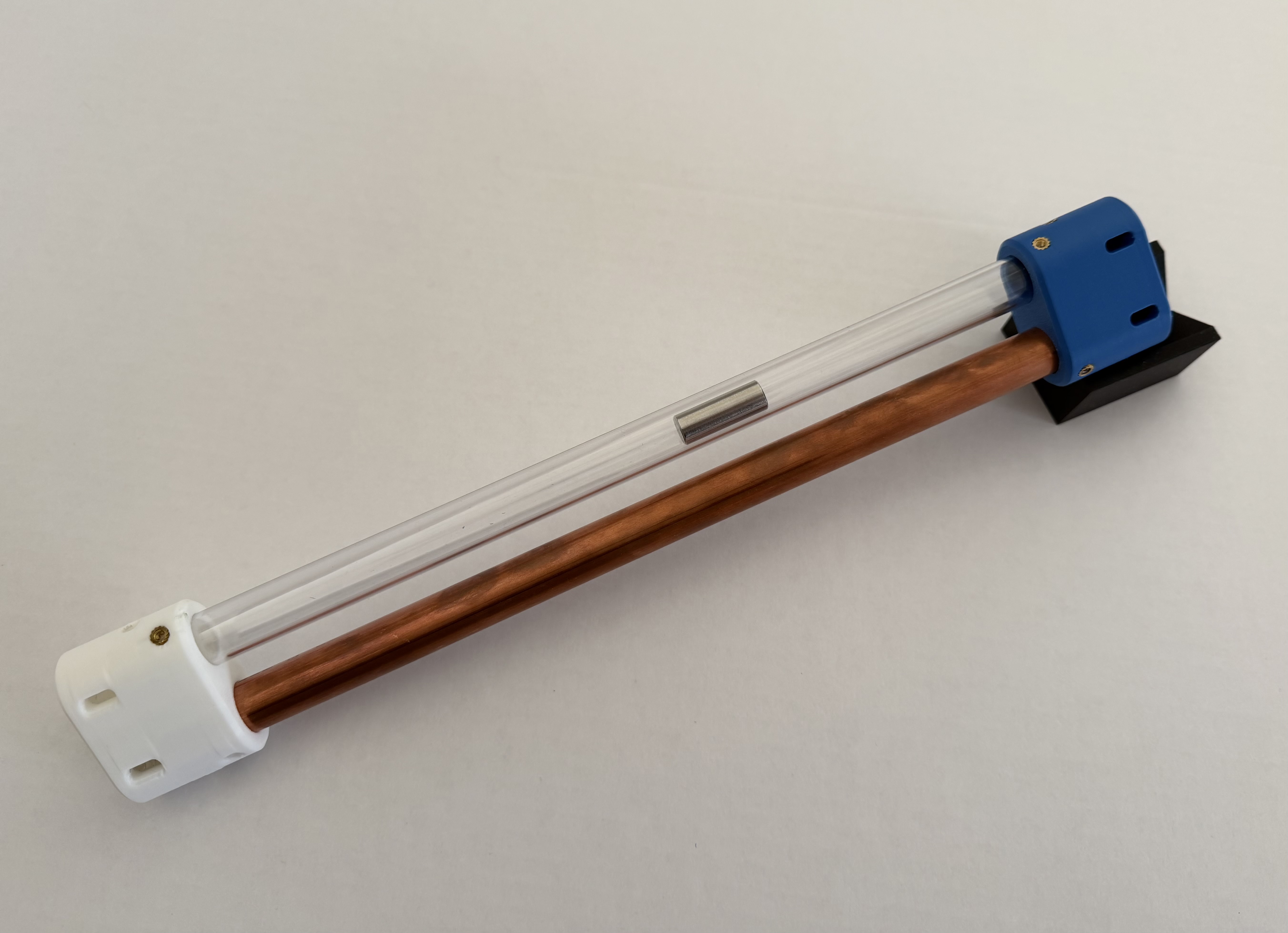 OpenApparatus Lenz’s Law demonstrator: parallel copper and polycarbonate tubes with 3D-printed end caps and stand